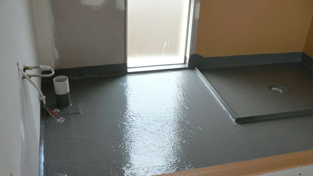Toilet floor with waterproofing membrane applied during resale HDB renovation